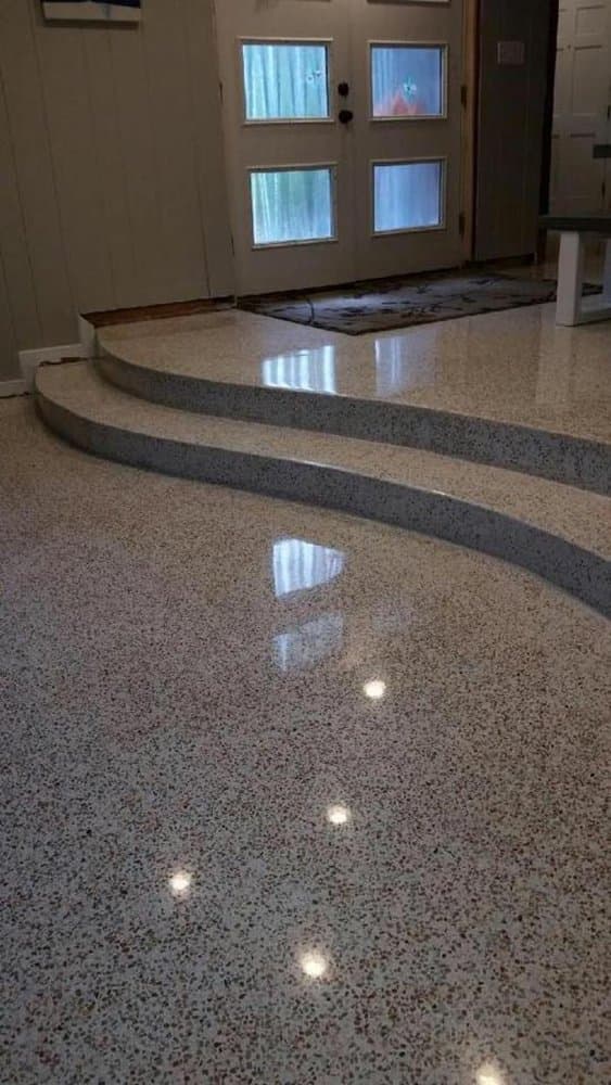 Polished curved terrazzo entry steps and floor with high-gloss finish