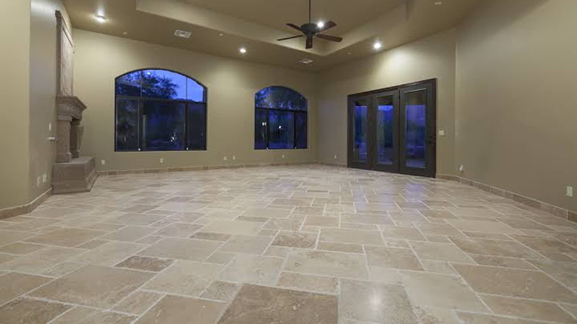 Technician performing a multi-stage travertine restoration